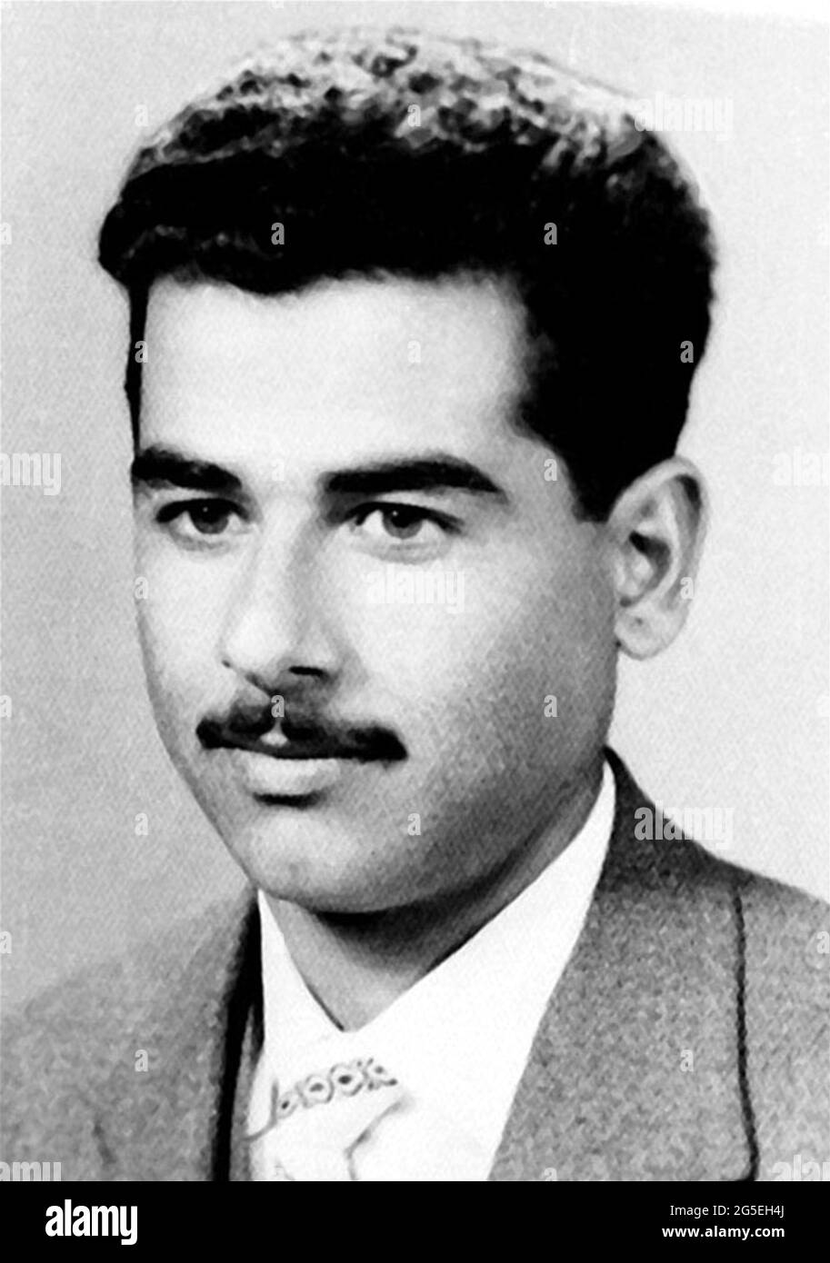 1956-c-bagdad-iraq-the-iraq-politican-president-saddam-hussein-1937-2006-when-was-young-aged-19-unknown-photographer-politic-politica-politician-politico-personalit-da-giovane-giovani-personality-personalities-when-was-young-dictator-dittatore-dictator-guerra-del-golfo-gulf-war-baffi-moustache-archivio-gbb-2G5EH4J.jpg