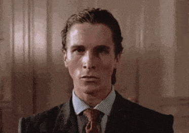 patrick-bateman-patrick-bateman-staring.gif