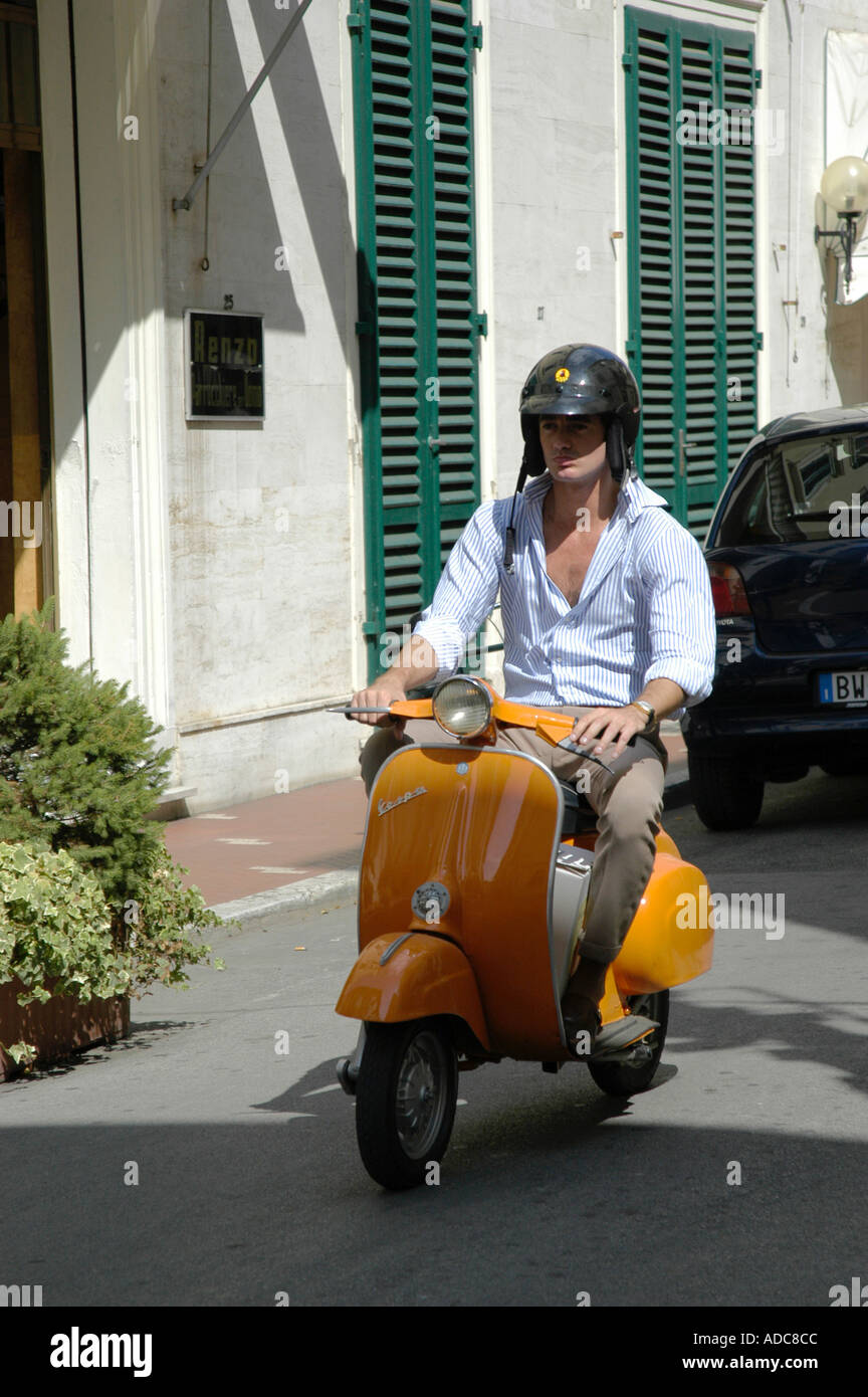 italian-man-riding-a-scooter-ADC8CC.jpg