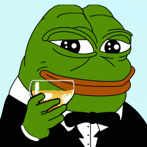 a green frog in a tuxedo is holding a glass of orange liquid