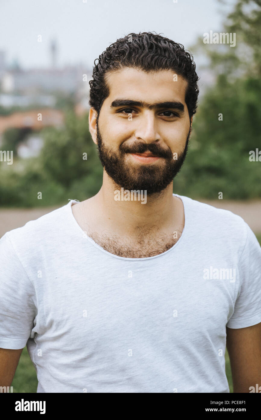 outdoor-portrait-of-cheerful-syrian-man-PCE8F1.jpg