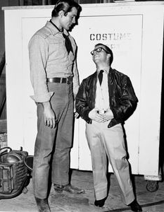 a lesser known western star, Clint walker, stood 6'6 inches tall. at the  time making him the tallest leading man in Hollywood. his imposing figure  would earn him the lead role in