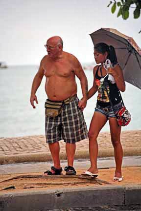 Relationship_between_old_white_man_and_young_thai_girl.jpg