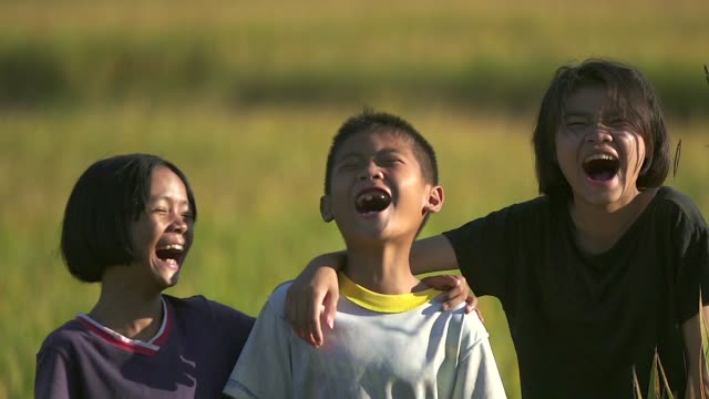 smiling-faces-young-children-smiling-and-having-fun-from-rural-part-of-southeast-asian.jpg