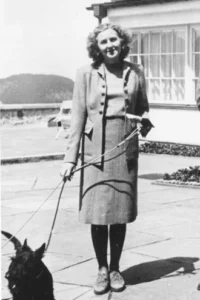 Eva_Braun_walking_dog-jpg-e1666902210499.webp