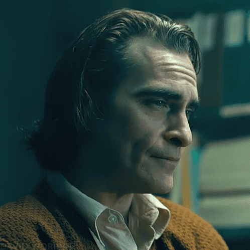 joaquin-phoenix-laughing.gif