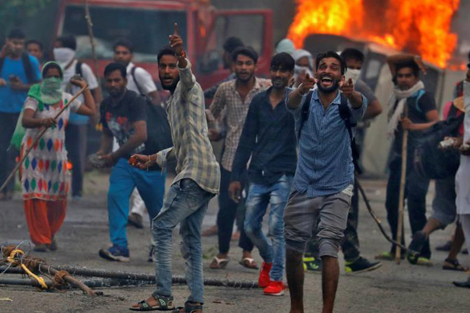 1670514-riots-1522150276.jpg