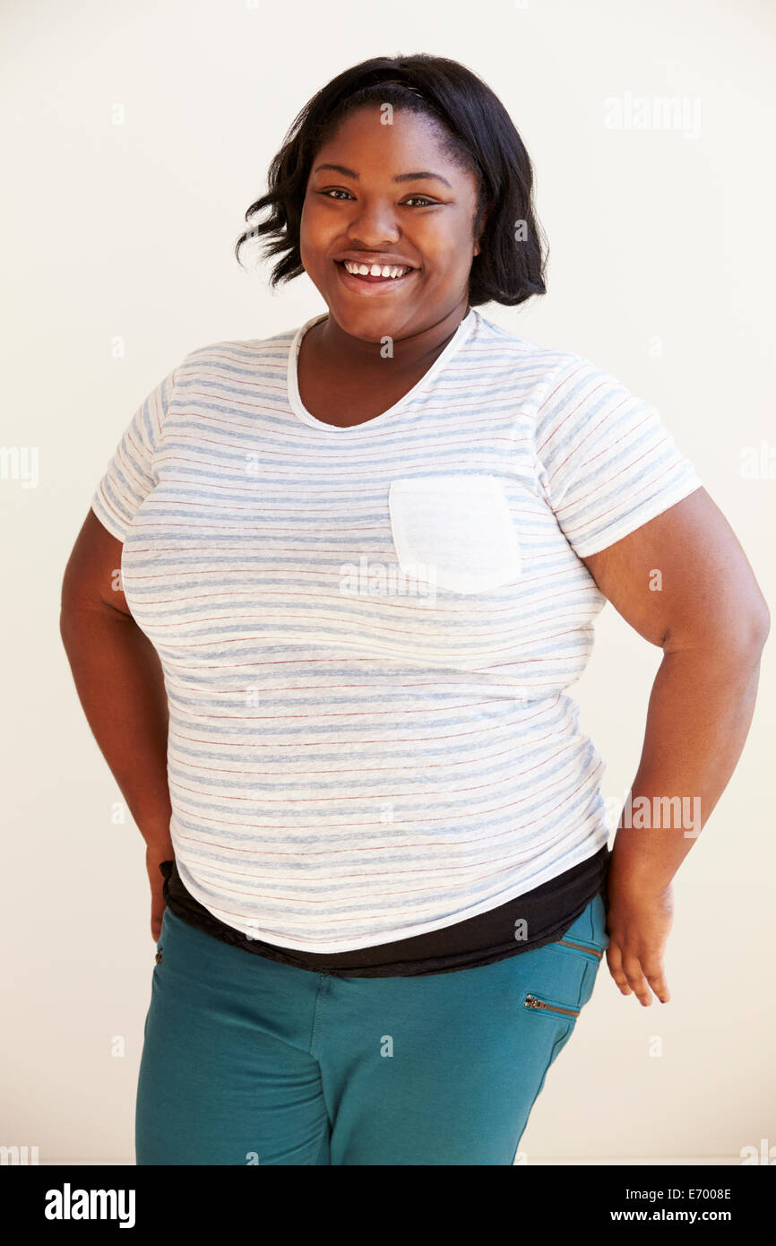 studio-portrait-of-smiling-overweight-woman-E7008E.jpg