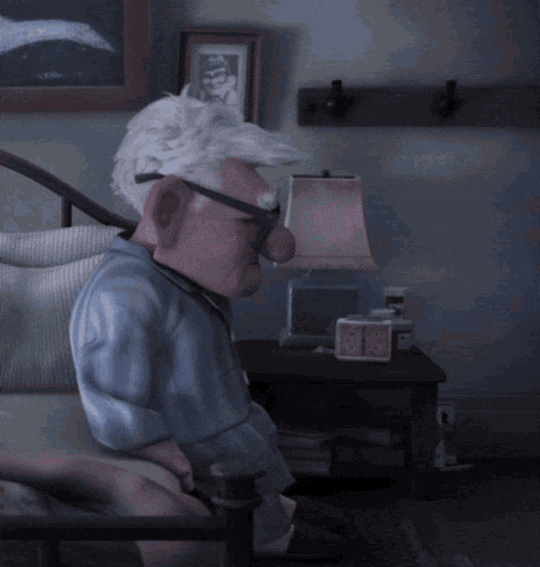 a cartoon character is sitting in a chair with a lamp and a clock on the table