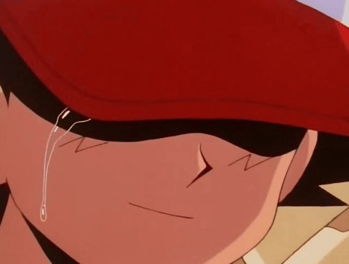 a close up of a cartoon character 's face with a red hat on