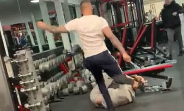 Gym-goers batter each other with metal exercise bars as shocking brawl breaks out at