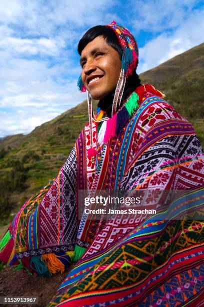 portrait-of-local-man-in-colourful-traditional-local-dress-including-festooned-woolen-hat-and.jpg