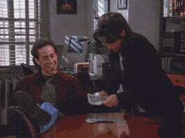 jerry seinfeld laughing GIF