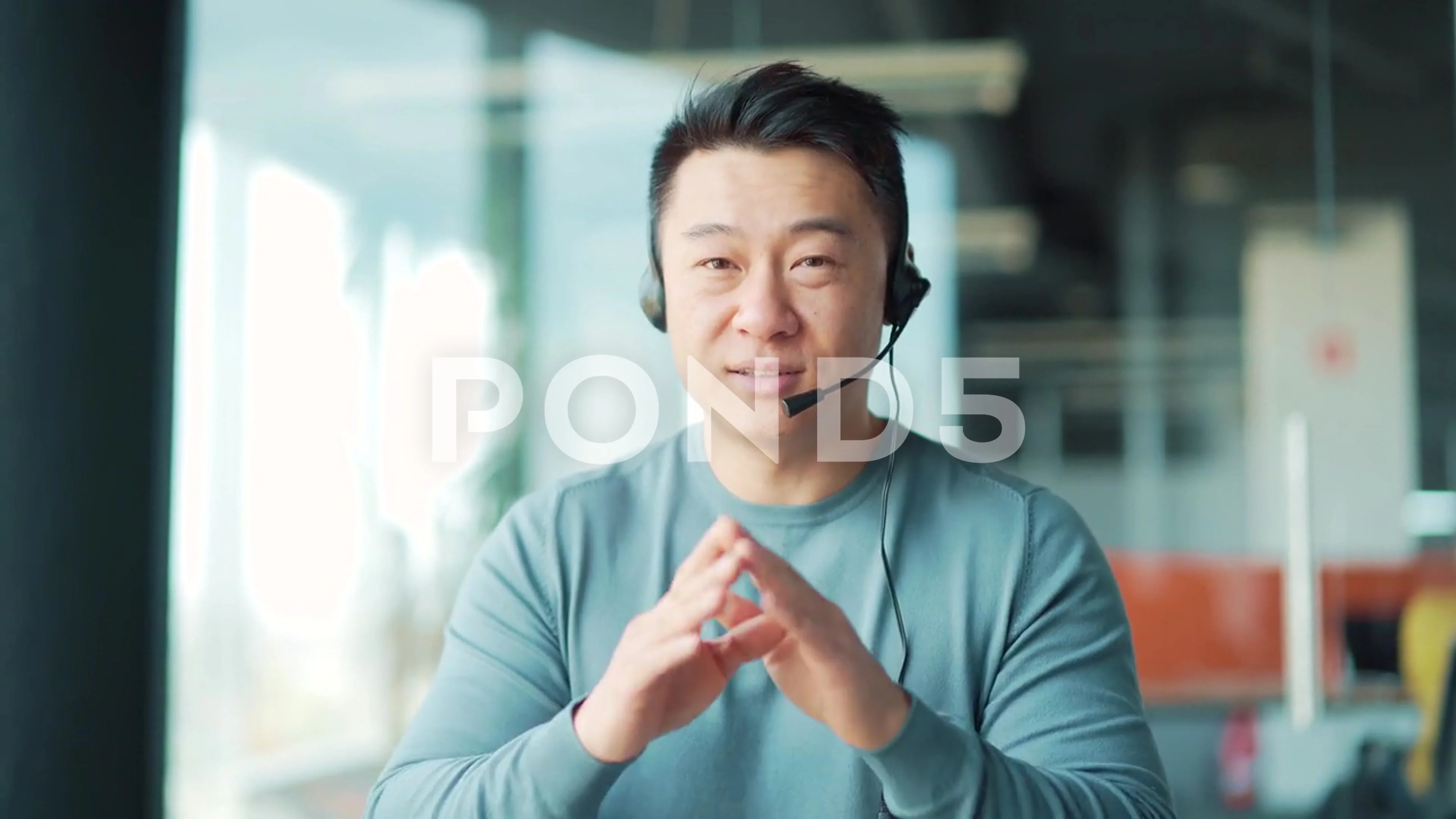 portrait-asian-man-talking-video-footage-166233653_prevstill.jpeg