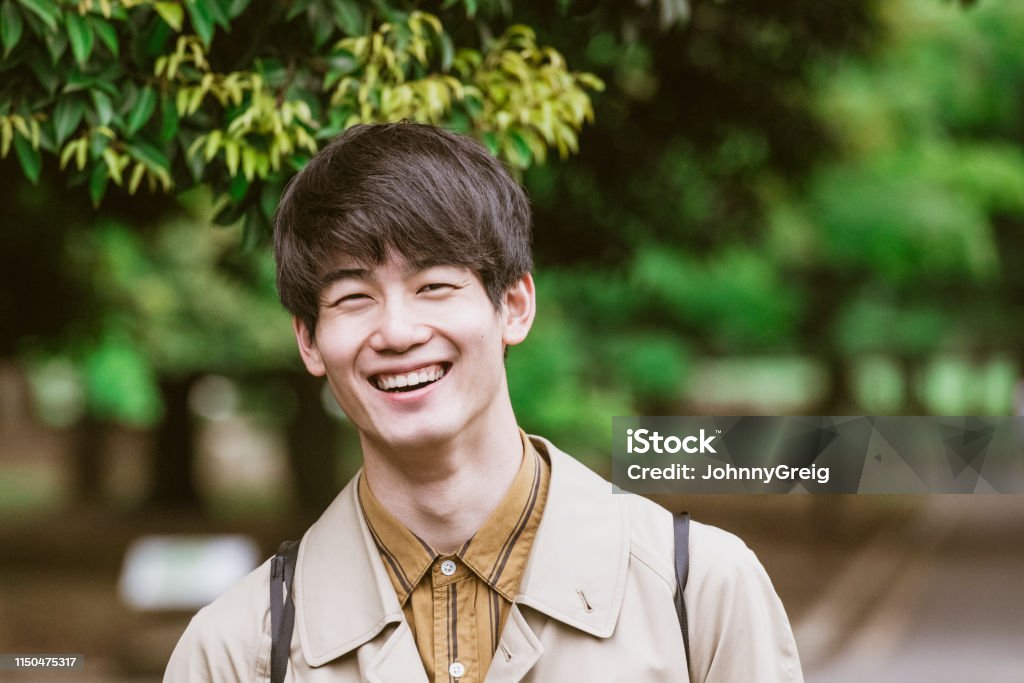 portrait-of-cheerful-japanese-young-man-smiling.jpg