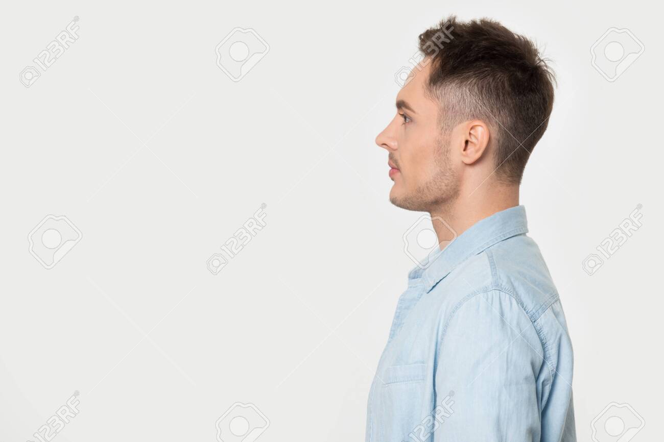 135182007-side-profile-view-young-confident-european-guy-looking-at-blank-empty-copy-space-for-advertisement-t.jpg