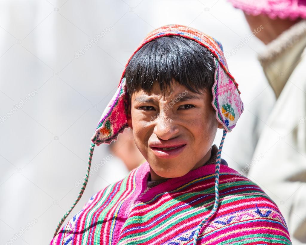 depositphotos_122667336-stock-photo-young-man-in-traditional-quechua.jpg