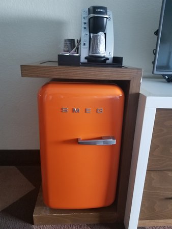 A retro mini fridge made to look like an SMEG refrigerator - Picture of  DoubleTree by Hilton Hotel Galveston Beach, Galveston Island - Tripadvisor