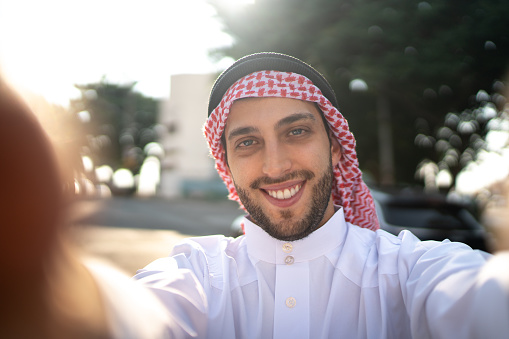 arab-middle-east-man-taking-a-selfie-at-street.jpg