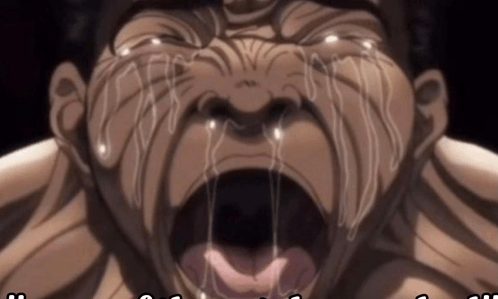 a close up of a man 's face with tears coming out of his eyes