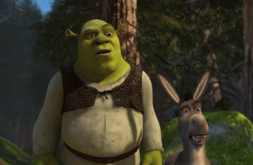 shrek and a donkey are standing next to each other