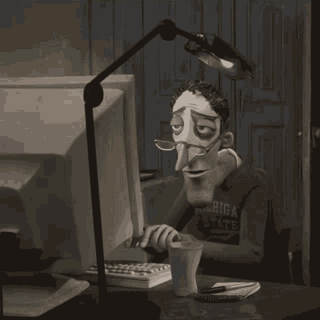a cartoon character wearing a michigan state shirt