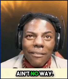 a man wearing headphones and a bandana says  ain 't no way 