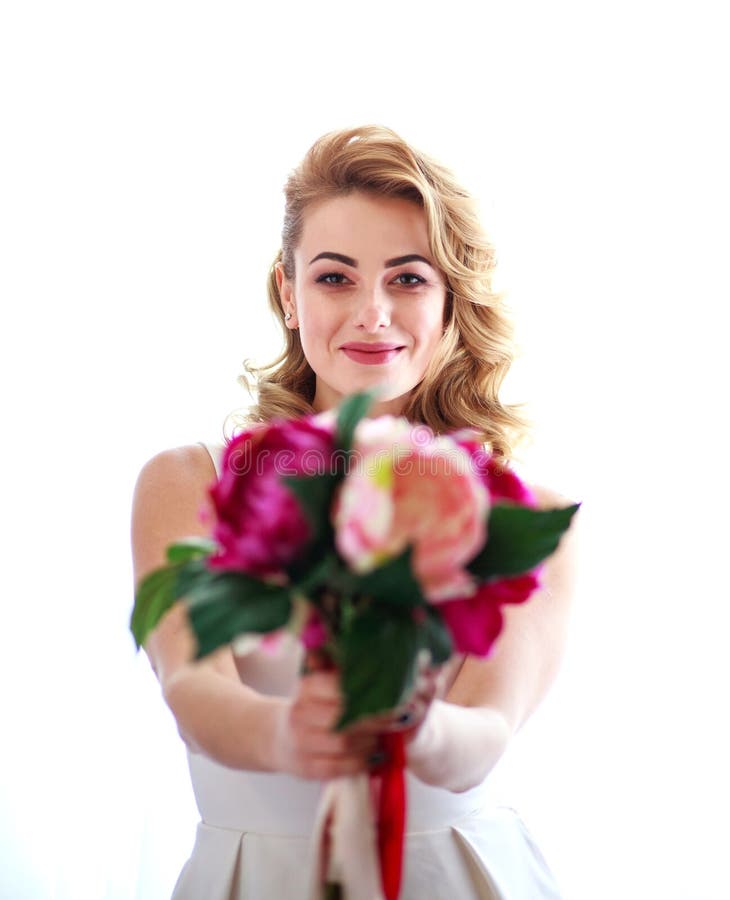 joyful-woman-giving-bouquet-flowers-isolated-white-113512516.jpg