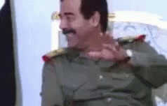 saddam-hussein-laughing.gif