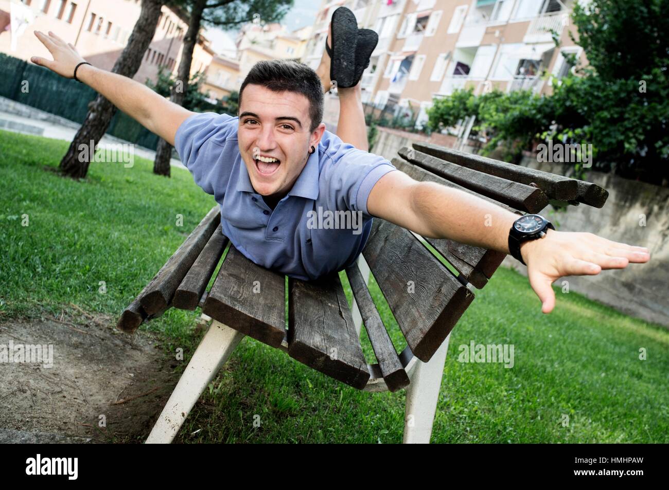 18-year-old-man-in-a-garden-barcelona-spain-europe-HMHPAW.jpg