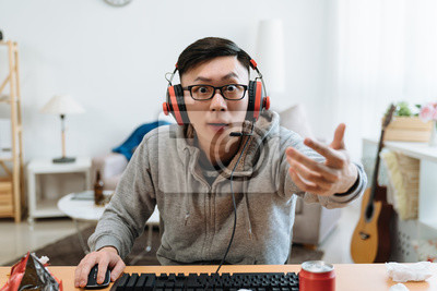 boy-plays-online-pc-game-staring-monitor-400-170133656.jpg