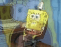 a spongebob squarepants character is sitting in a chair in front of a computer .