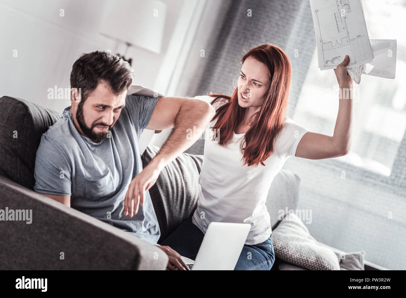 unhappy-young-woman-being-angry-at-her-husband-PW3R2W.jpg