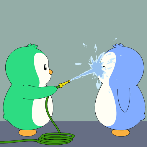 a green penguin is spraying water on a blue penguin 's face