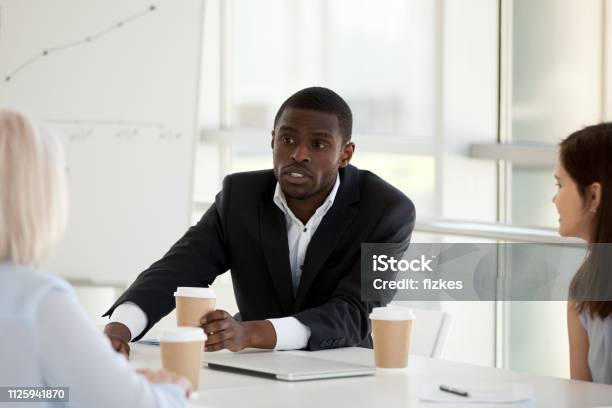 diverse-business-people-discussing-brainstorming-during-meeting.jpg