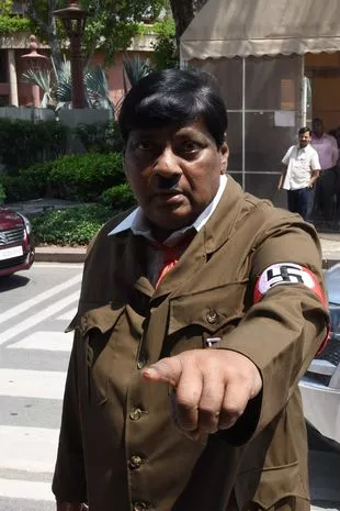 Indian MP sparks outrage turning up to Parliament dressed as HITLER 'to  grab attention' - World News - Mirror Online