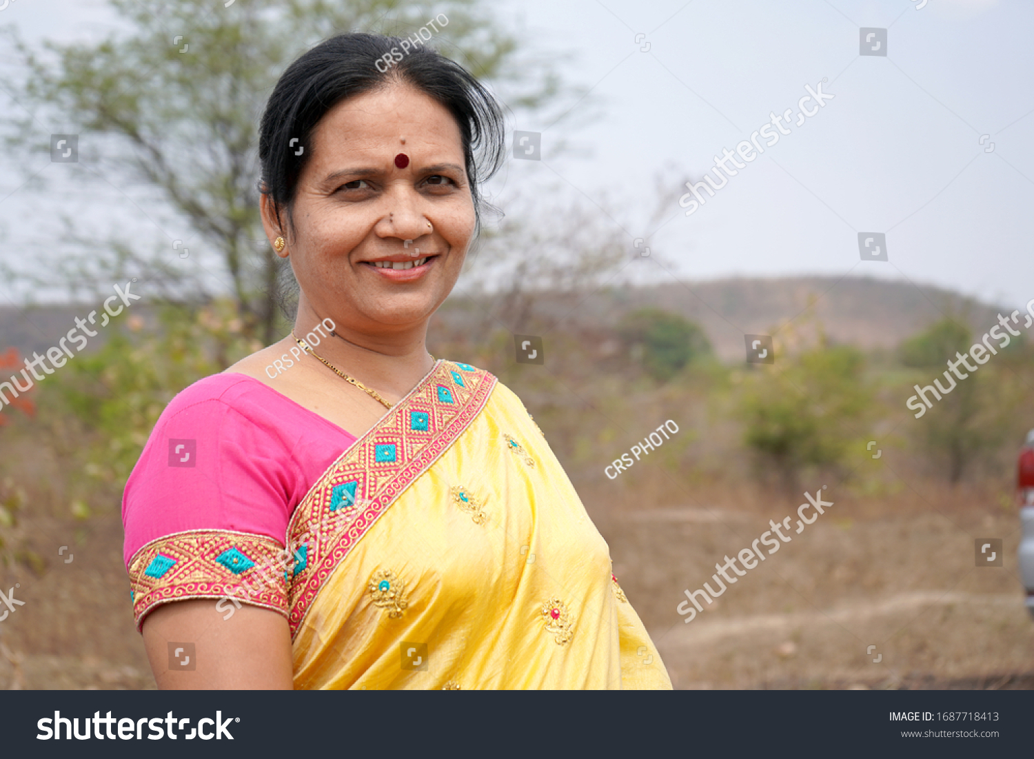 stock-photo-portrait-of-indian-woman-at-outdoor-1687718413.jpg