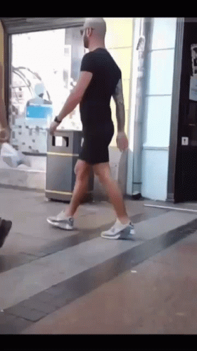 andrew-tate-walking.gif