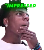 a man with a green crown on his head and the word impressed above him