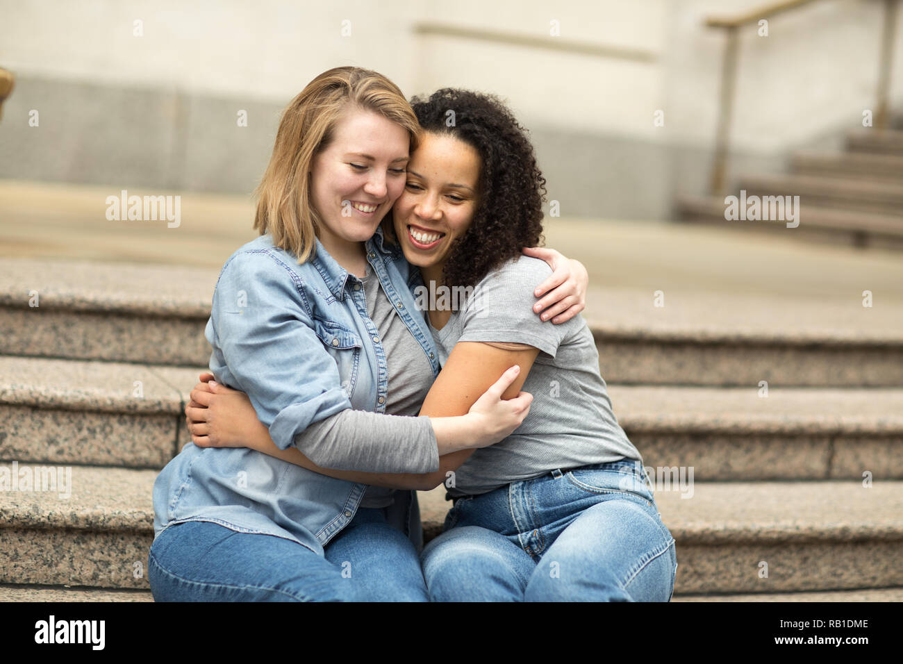 happy-lesbian-couple-hugging-each-other-RB1DME.jpg