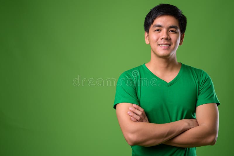 young-handsome-filipino-man-against-green-background-studio-shot-young-handsome-filipino-man-against-green-background-131346328.jpg
