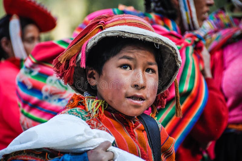 quechua-boy-village-andes-ollantaytambo-peru-mountains-over-62856129.jpg