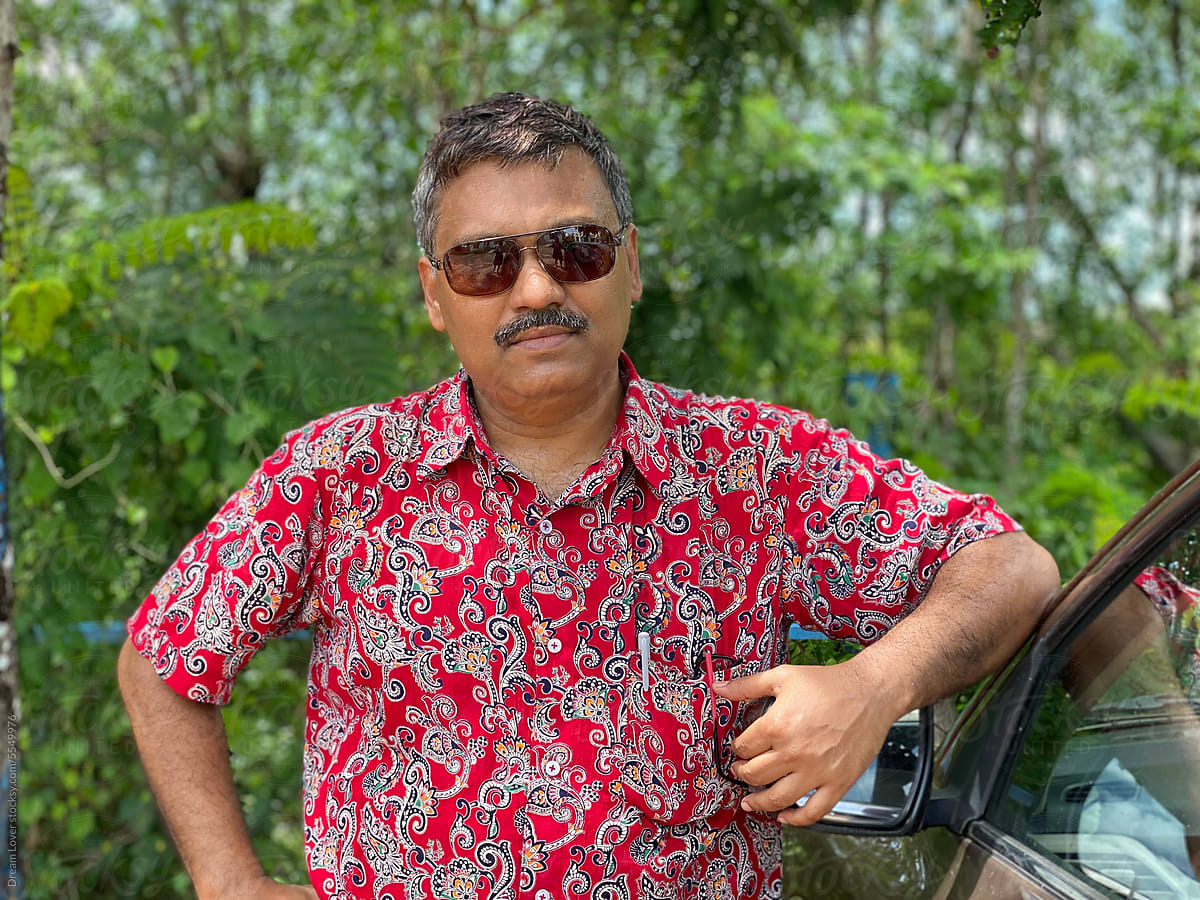 Portrait Of A Fashionable Middle Aged Indian Man At Outdoors by Stocksy  Contributor Dream Lover - Stocksy