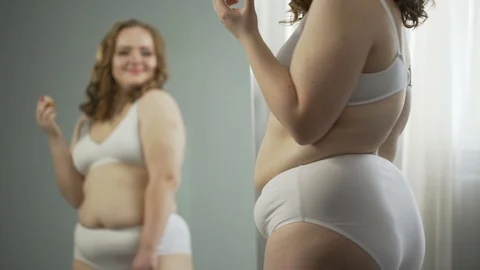 fat-lady-underwear-looking-her-footage-074935671_iconl.jpeg