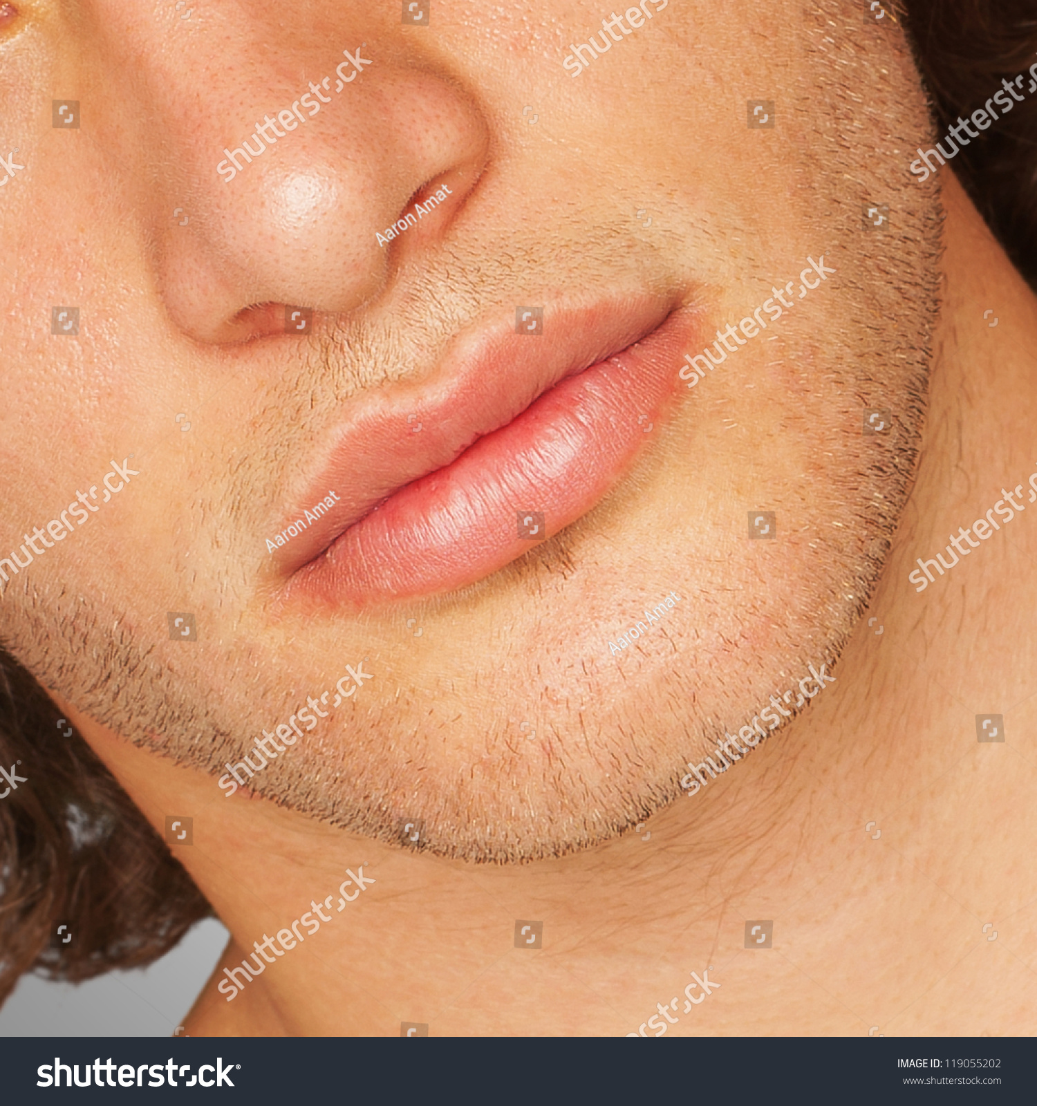 stock-photo-close-up-of-man-s-face-lips-119055202.jpg