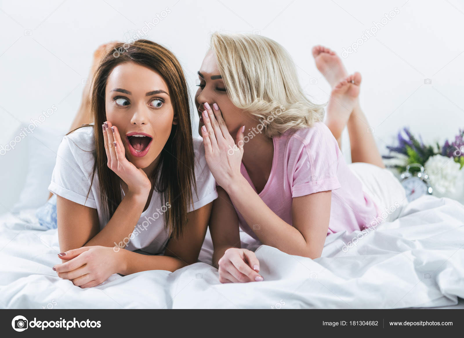 Beautiful Shocked Girls Gossiping Bed Stock Photo by ©AllaSerebrina  181304682