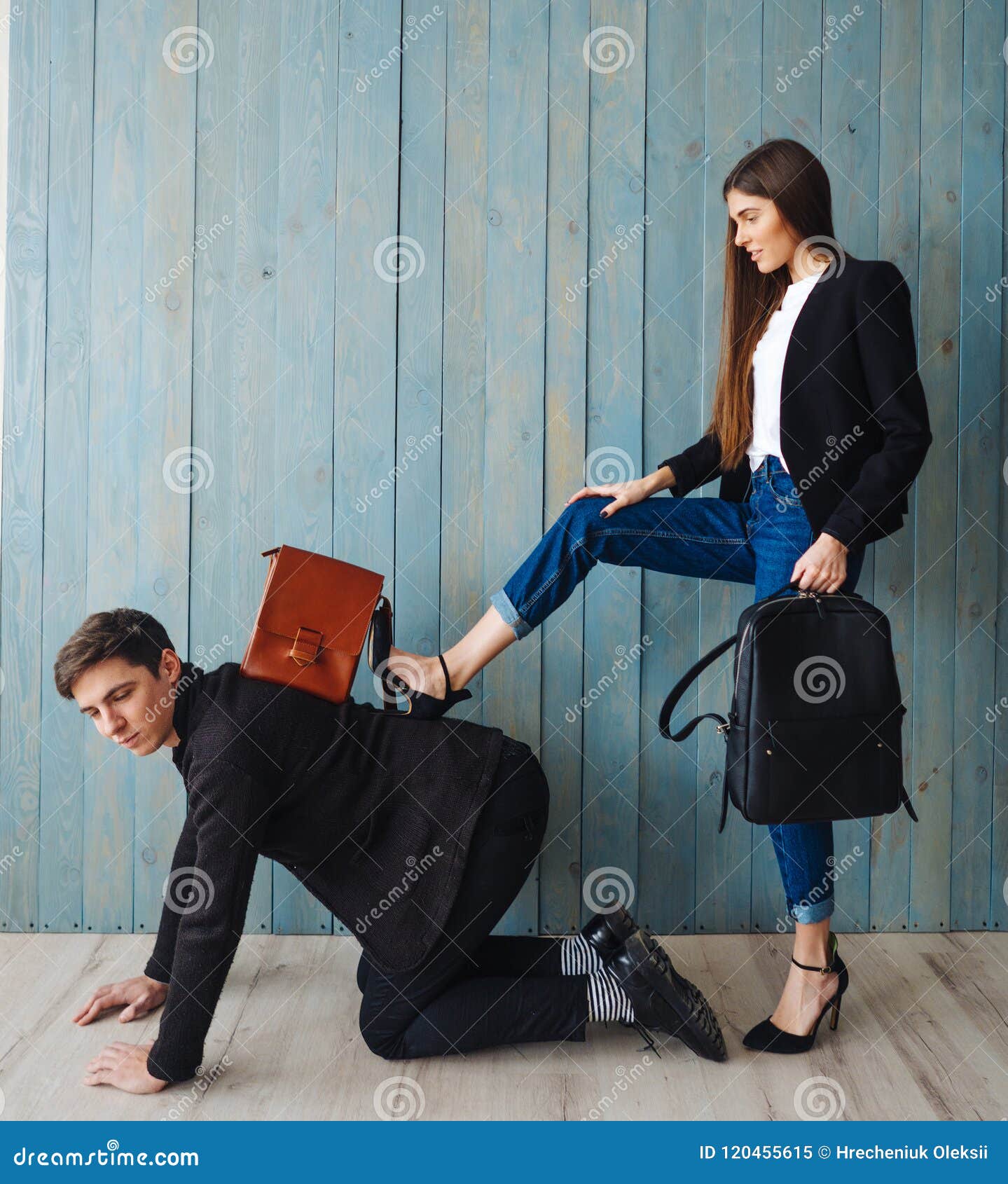 girl-put-her-foot-guy-s-back-room-120455615.jpg