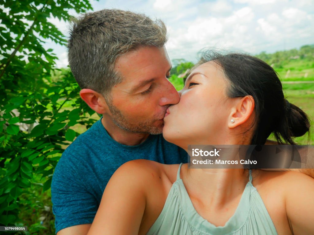 young-beautiful-and-happy-mixed-ethnicity-couple-beautiful-asian-chinese-woman-and-white-man.jpg