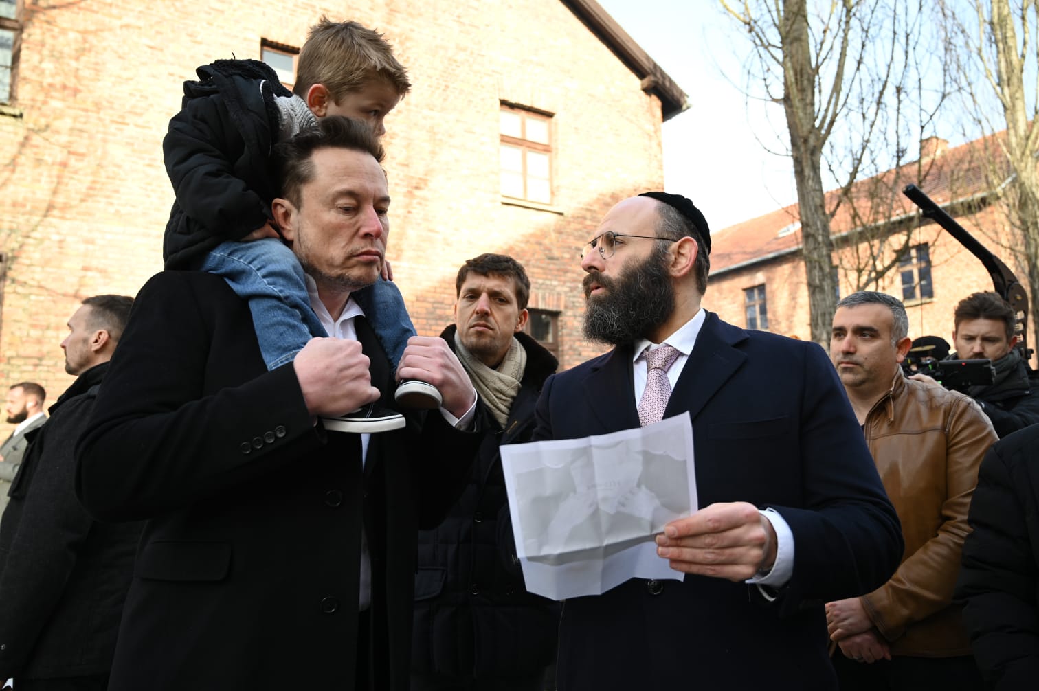 Elon-Musk-with-EJA-Chairman-Rabbi-Menachem-Margolin-in-Auscwitz-3.jpg