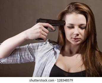 Woman pistol pointing on her 260nw 128348579
